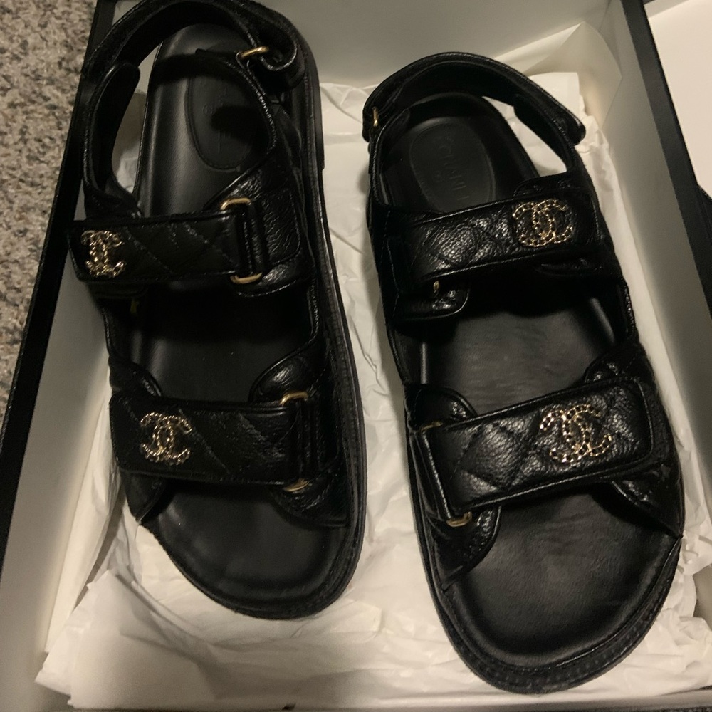 Black leather Chanel dad sandals with gold hardware
